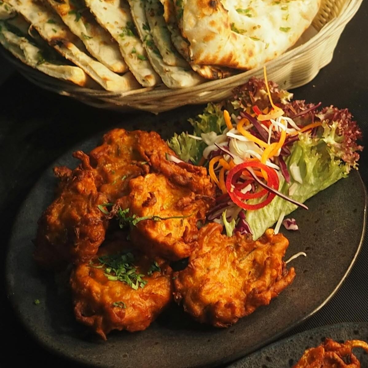 Stovetop Recipes crispy onion bhaji with salad on a plate